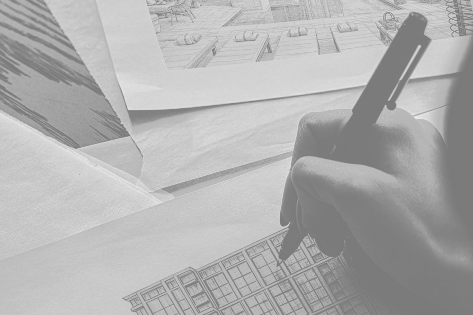 Black and white photograph of an architect's hand sketching the tower's façade over technical drawings