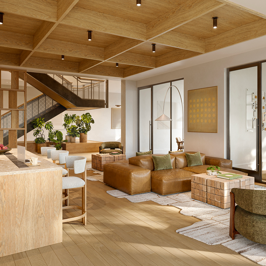 Rendering of the co-working lounge, a double-height space with lounge seating, a bar counter with stools and a staircase rising to a mezzanine