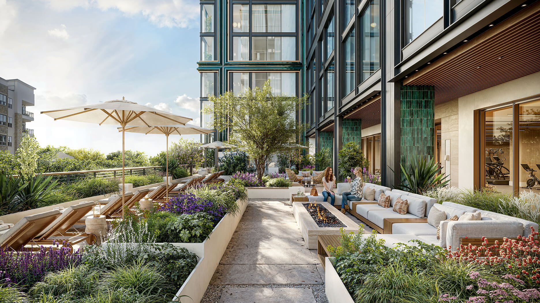 Rendering of the landscaped amenity terrace, with sun loungers, a fire-pit seating area and planted gardens beneath the tower's glass and green-tile façade